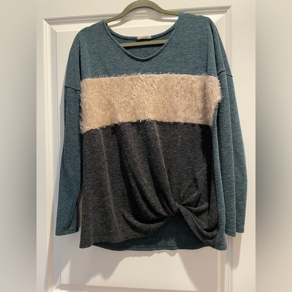 Boutique sweater with fuzzy stripe and knot in bottom